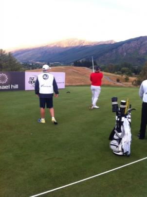 All Black great Grant Fox watches son Ryan prepare for his opening round of the New Zealand Open...