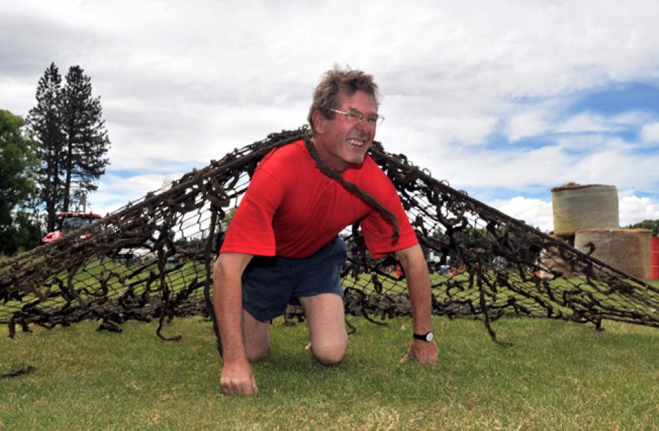 Allan Paterson, from Gimmerburn, tackles the obstacle course.