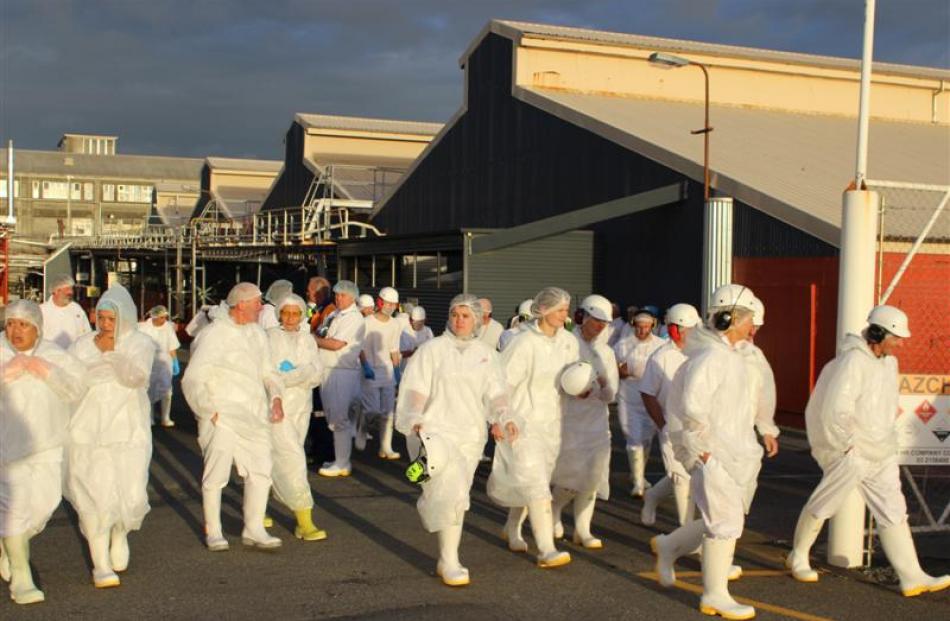 Alliance Group workers evacuate Alliance's Lorneville Plant after an ammonia leak last night....