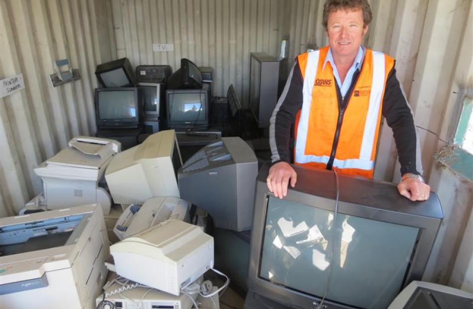 AllWaste manager Mark McKone stands  at the Queenstown Refuse Station  beside the latest...