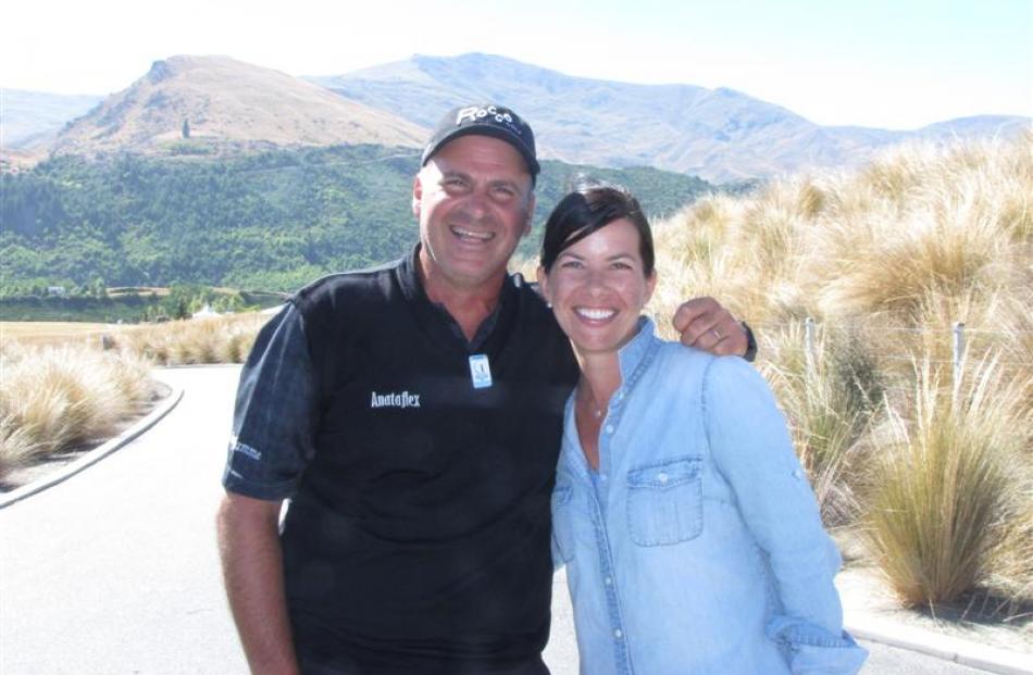American  Rocco Mediate, star attraction of the New Zealand Open, and wife Jess, who married...