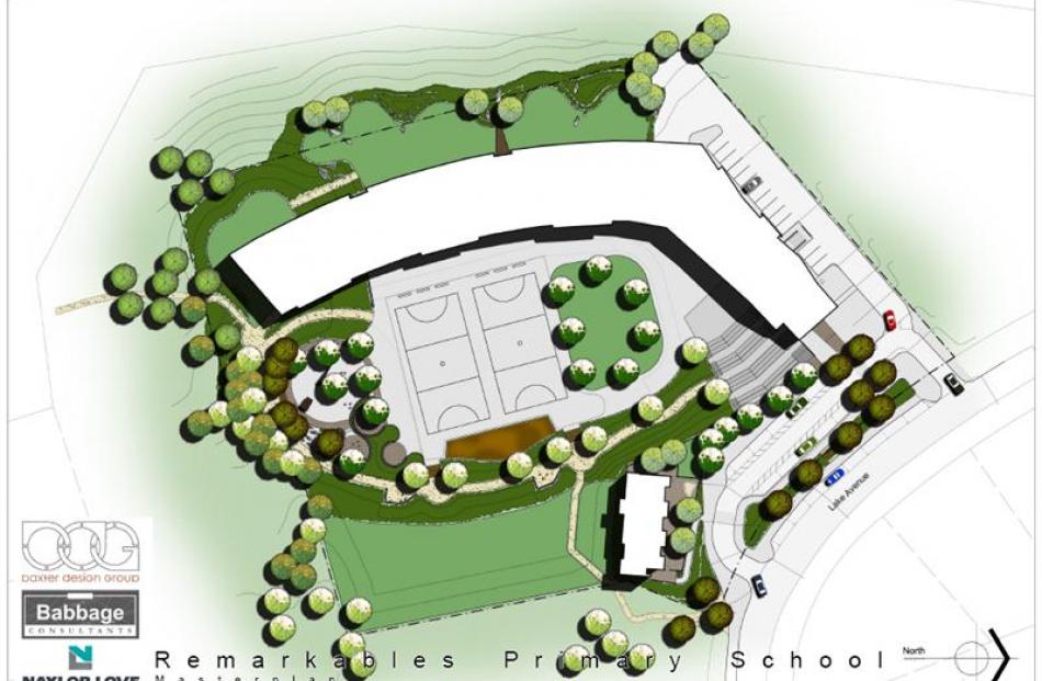 An aerial view of the school shows the five "learning pods" on two levels in the main block, an...