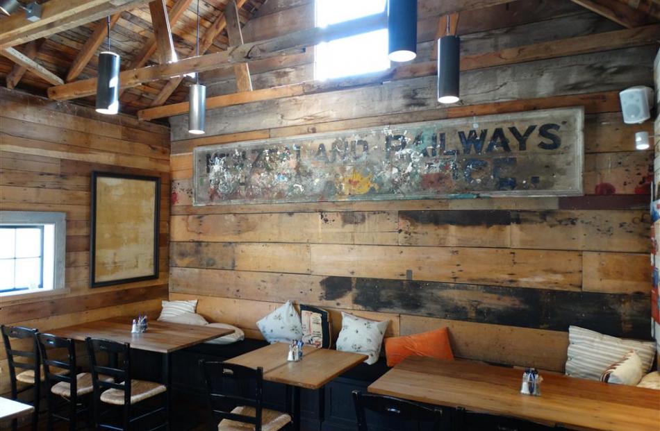 An original sign is displayed inside The Boatshed Cafe & Bistro at Frankton Marina. Much of the...