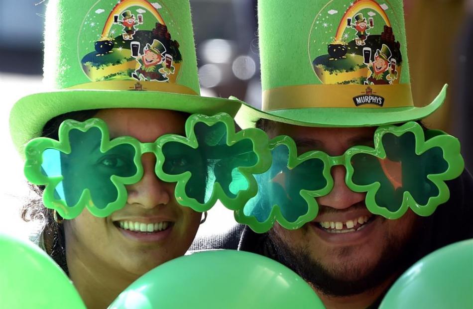 Ana Teofilo (left) and Ilai Faanunu, both of Dunedin, celebrate St Patrick’s Day in the Octagon...