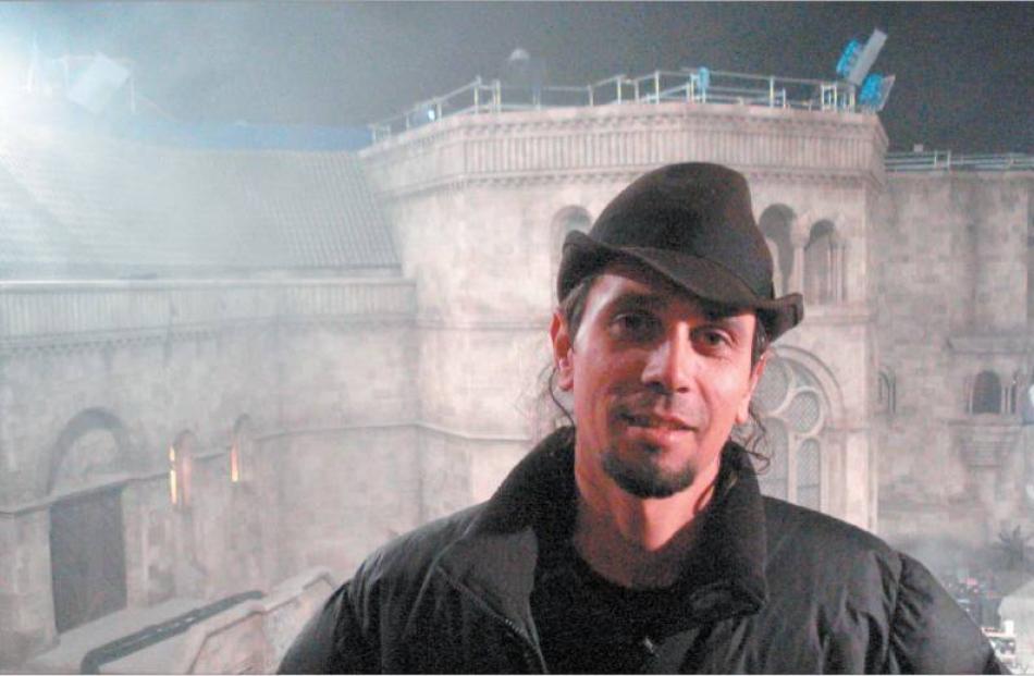 Another day of night shoots: Grant Bryant in a turret on a castle set built in Prague.