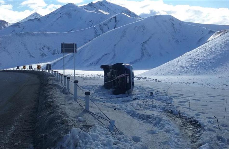 Another overturned car in the cellphone ''black spot'', on the Lindis Pass road, last Friday. No...