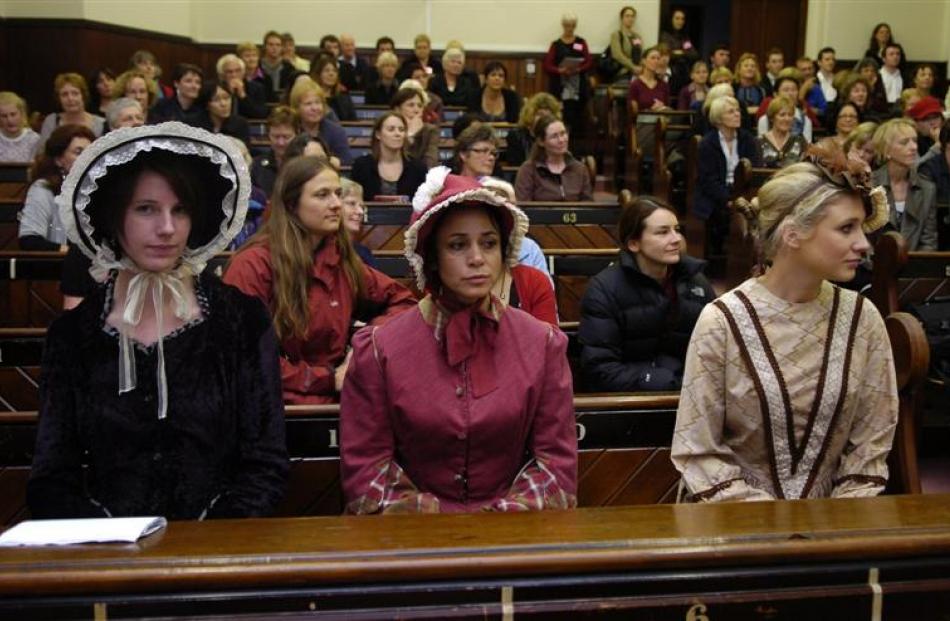 Appearing in a performance as pioneering students from the University of Otago`s past are (from...