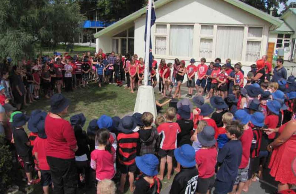 Respect...Pupils, staff and families from Alexandra Primary School observed two minutes silence...