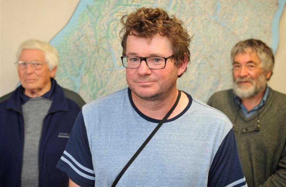 Aramoana Conservation Trust chairman Bradley Curnow (front) turned up at the Department of...