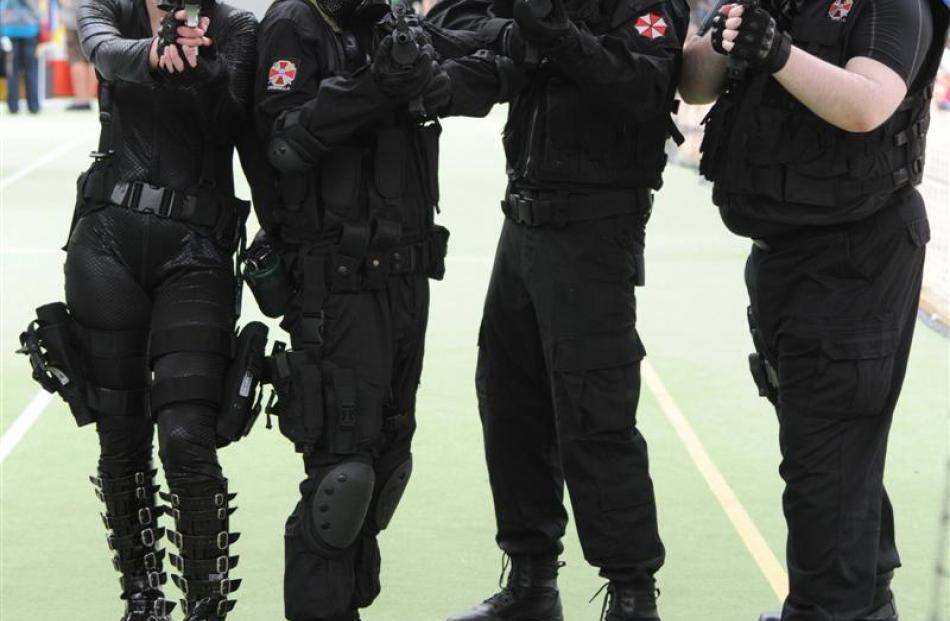 Team Evil . . .  (from left) Resident Evil alpha team (from left) Jazz Briggs, Tony Mackay, Nic...