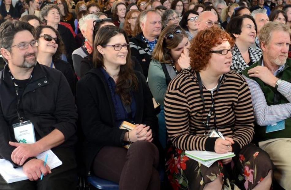 The audience listens as Arts, Culture and Heritage Minister Maggie Barry talks about the role of...