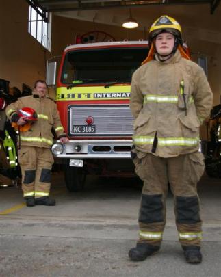 Ashley Diamond ready for action at the Tapanui Volunteer Fire Brigade's station. With him is his...