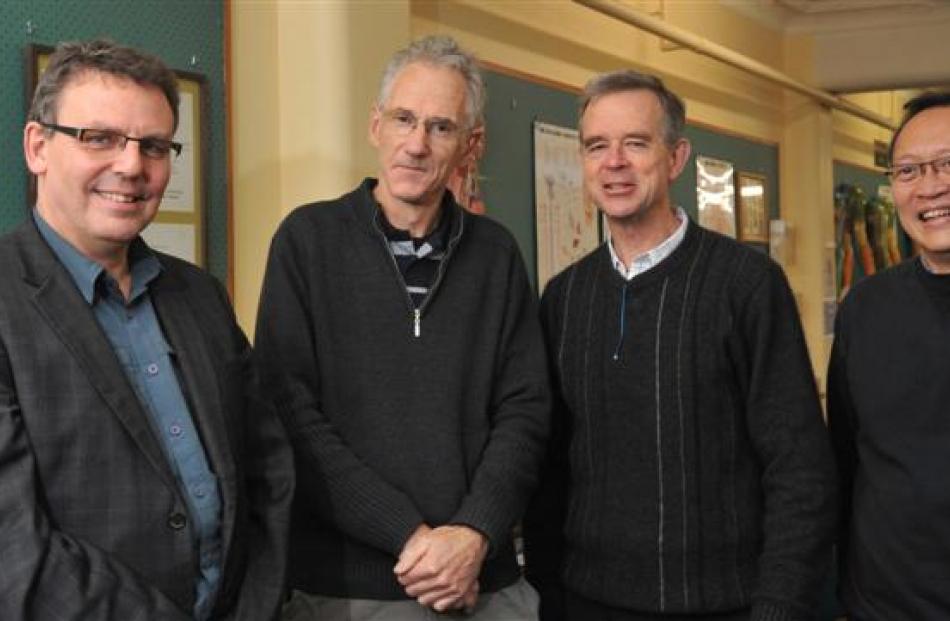 Assoc Prof John Reynolds' (left) multidisciplinary Parkinson's research team includes (from...