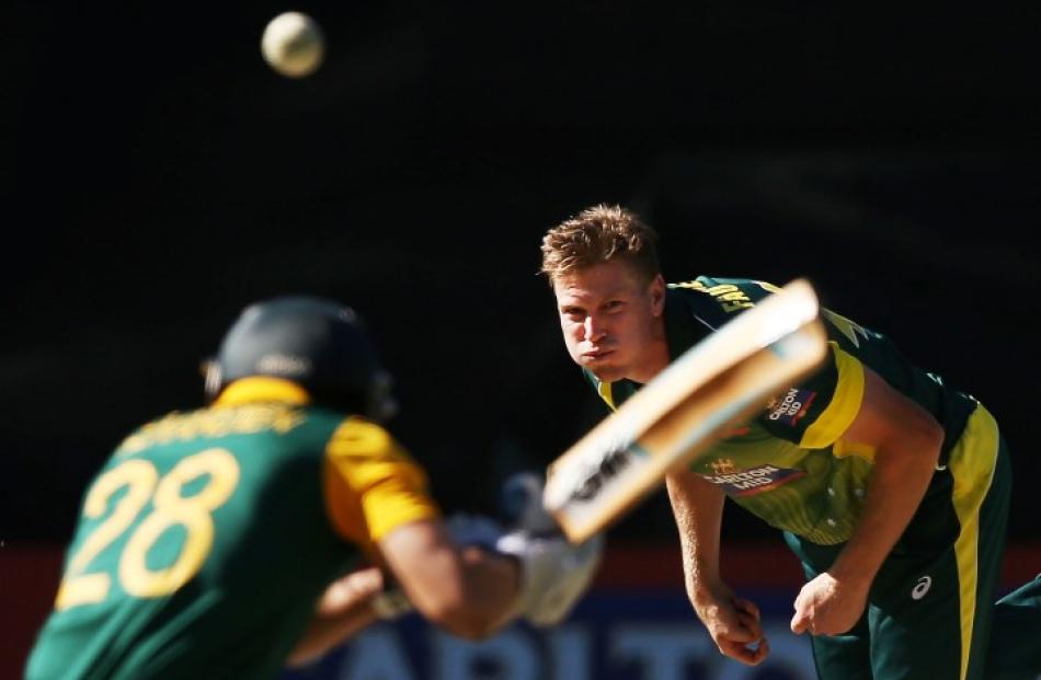 Australia's James Faulkner bowls a bouncer to South Africa's Farhaan Behardien during a recent...