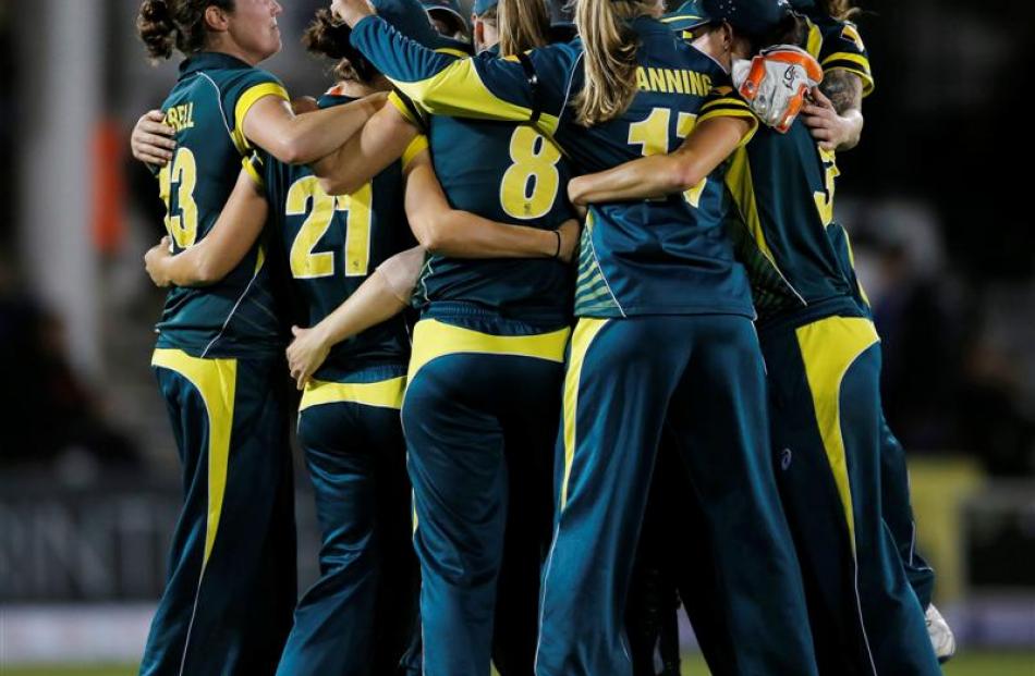 Australian players celebrate after reclaiming the women's Ashes. Photo: Reuters.