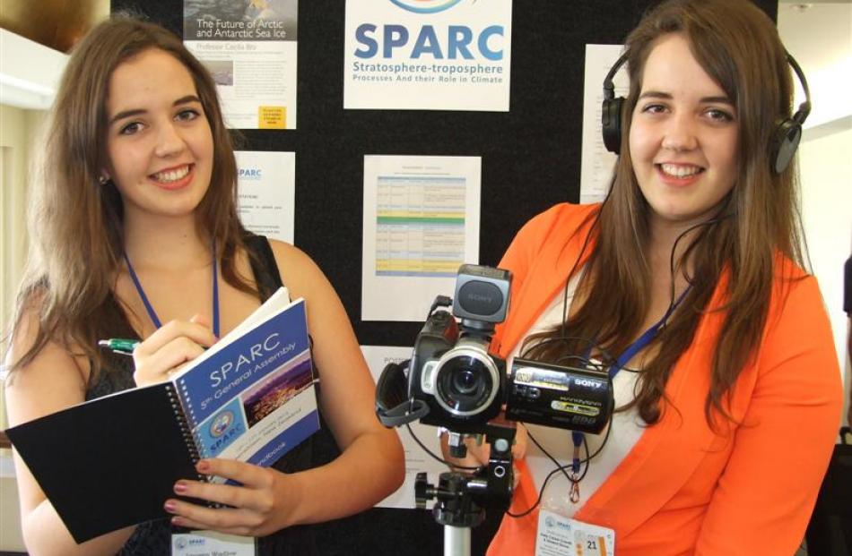 Australian twins Imogen (left) and Freya Wadlow have been decoding climate science talks in...