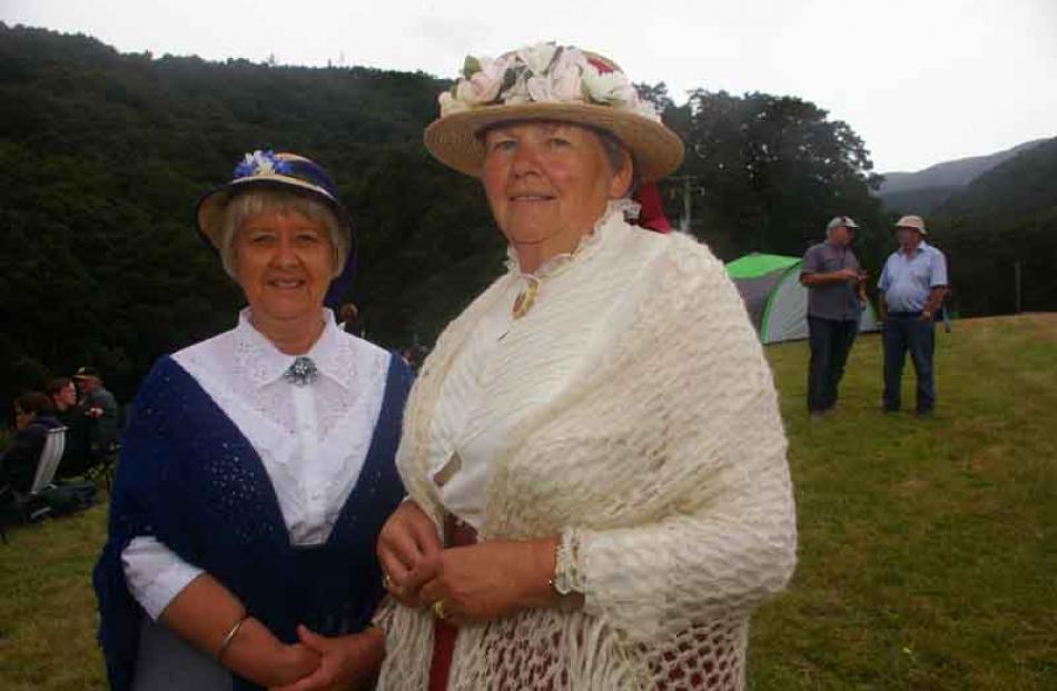 Rhonda Haugh, left, and Diane Glennie, of Crookston, show some period style.