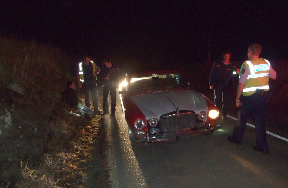 An 18-year-old is arrested by police following a pursuit involving this 1973 Daimler near Oamaru...
