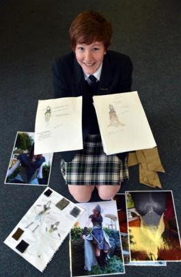 Bayfield High School pupil Emma Rogers-Bromley (16) shows photographs and sketches of her  ...