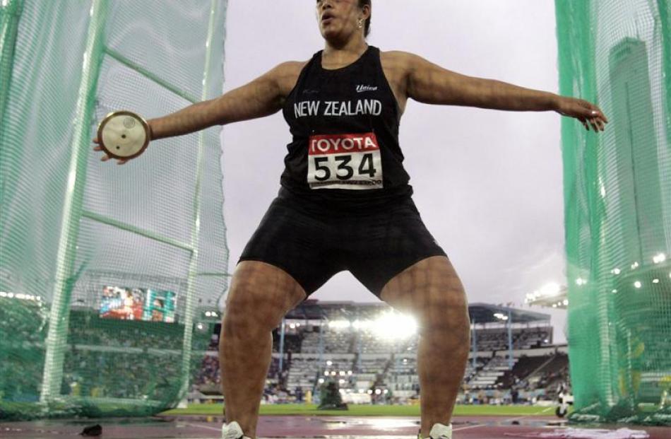 Beatrice Faumuina competes in the women's discus final at the world athletics championships in...