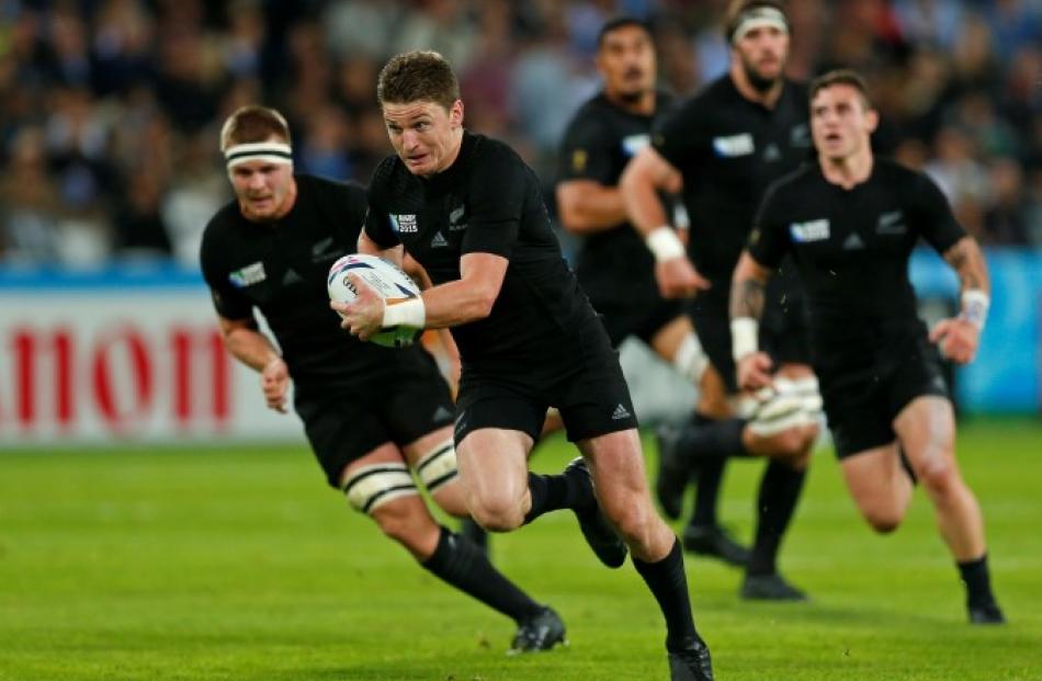 Beauden Barrett heads for the tryline against Namibia. Photo Reuters