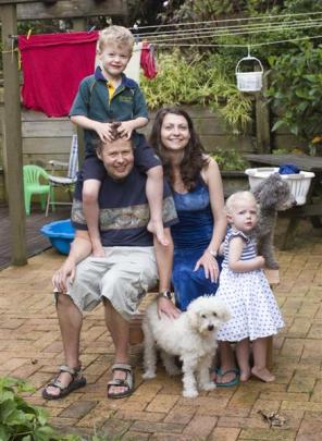 Ben and Rachel Martin with their children, Daniel and Elizabeth, and their dogs, Zeki and Freud,...