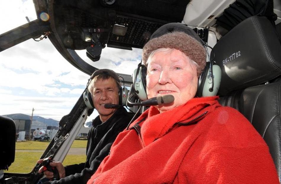Betty Sharpe (92) before her scenic flight over Dunedin with Helicopters Otago owner and pilot...