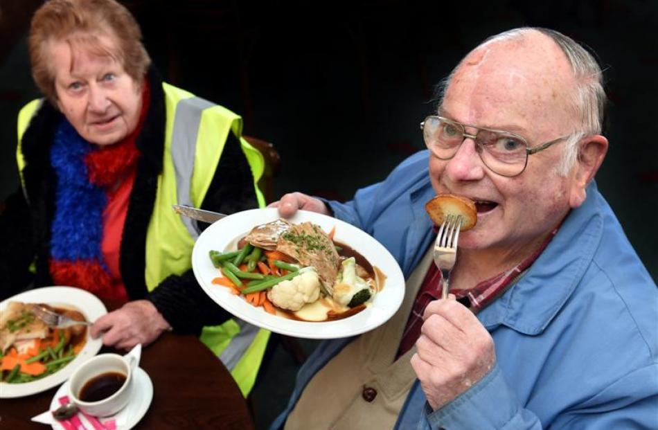 Bev Middleton (79) and  Ian Robinson enjoy a free lunch, thanks to a generous donation from a...