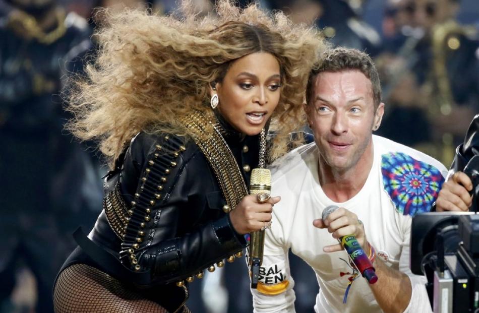 Beyonce and Chris Martin of Coldplay perform together. Photo: Reuters