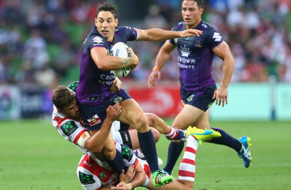 Billy Slater looks to offload during the Melbourne Storm's game against the St George-Illawarra...