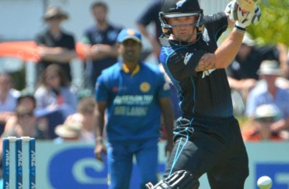 Black Caps wicketkeeper-batsman Luke Ronchi plays through the offside off the back foot during...