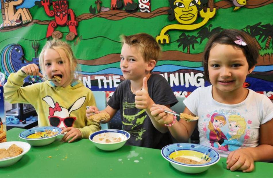 Bradford School pupils (from left) Tremorgan Ottley (6), brother Sam Ottley (7) and Kyra-Leigh...