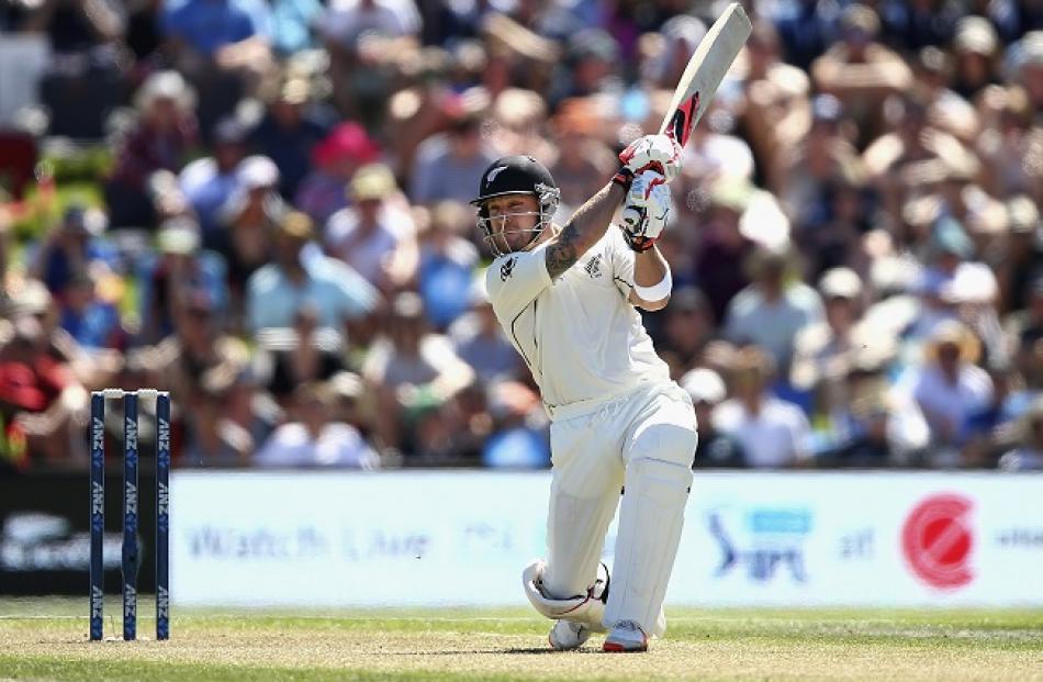 Brendon McCullum crashes another shot away on his way to the fastest hundred in test history....
