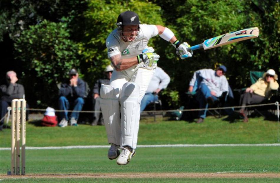 Brendon McCullum takes evasive action. Photo by Gerard O'Brien.