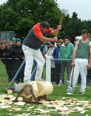 Brian Gutsell, of Gore, competes in the woodchopping section at the South Otago A and P Show in...
