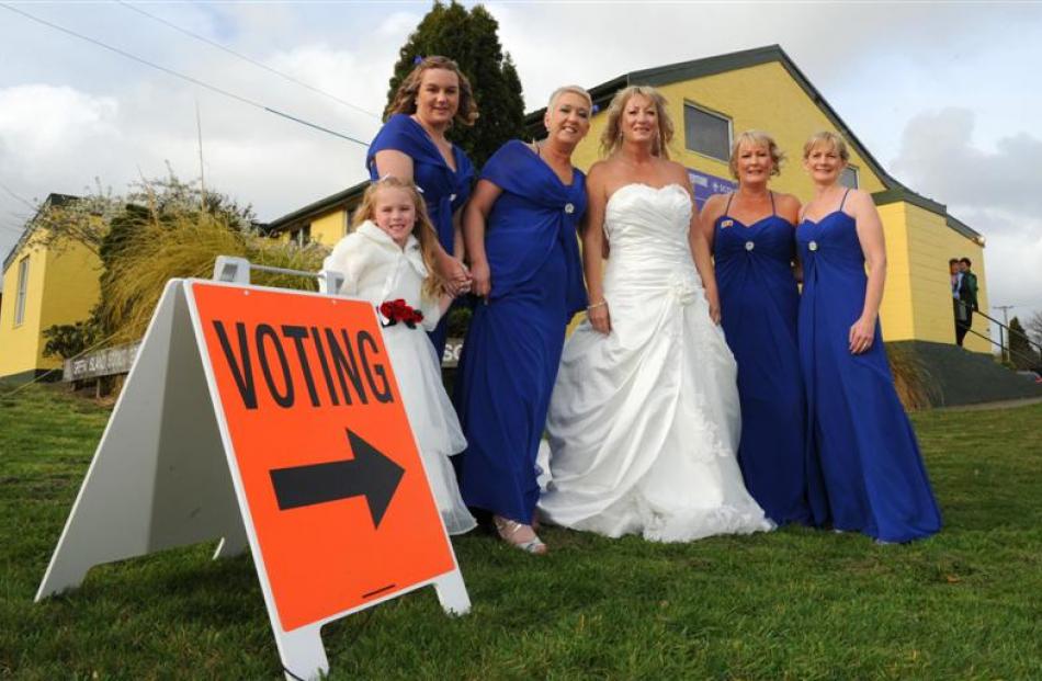 Bride Diane Whalley  is joined by (from left) flower girl Shawna Henderson, Tracey Henderson,...