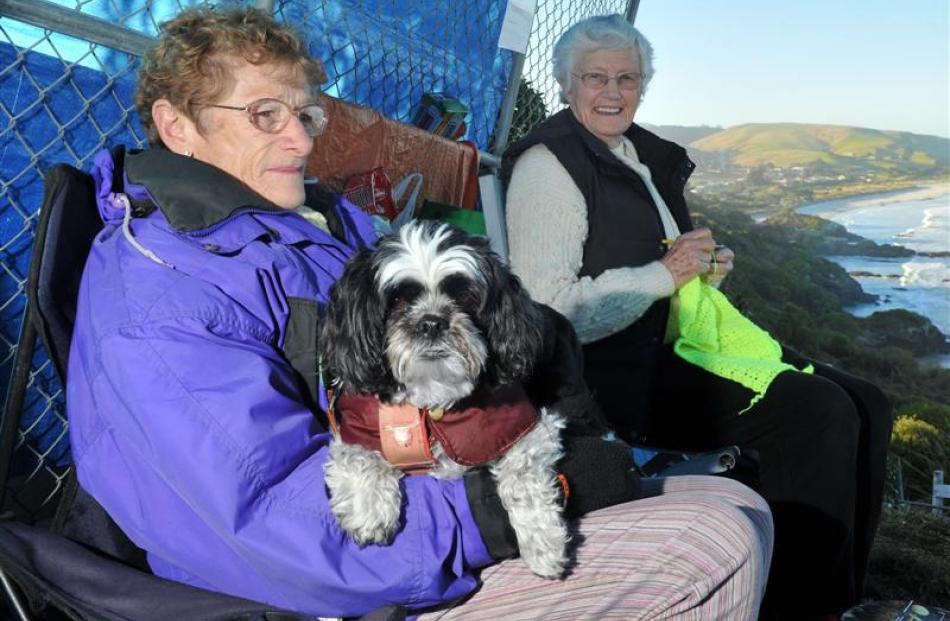Brighton residents June McGregor (81, left), with her dog Penny, and Hazel Leslie (78) protest...