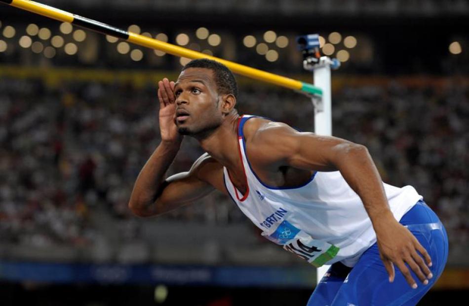 Britain's Germaine Mason reacts after an attempt in the men's high jump final. He won silver. AP...