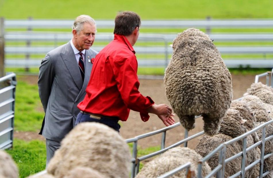 Prince Charles (L) chats with farm manager Brent Thornbury during a visit to the Leenavale Sheep...