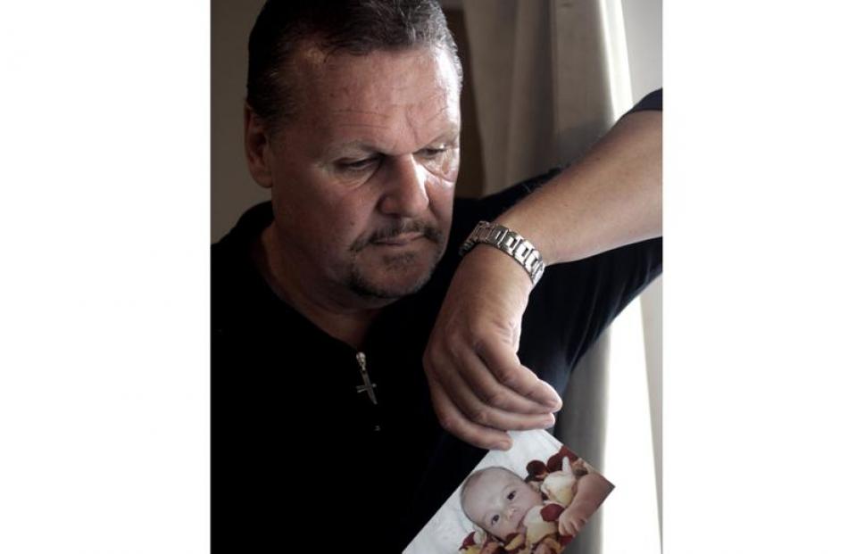 Bruce Laybourn with a photo of Dylan. Photos by NZ Herald.