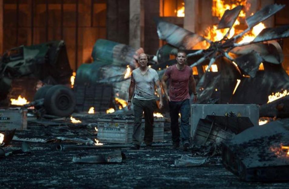 Bruce Willis and Jai Courtney in A Good Day to Die Hard.