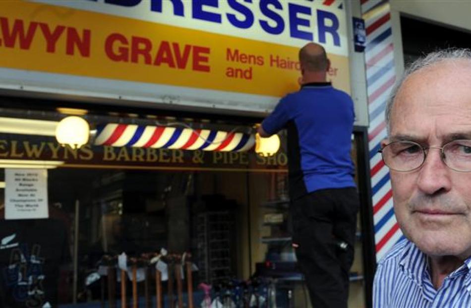 Business owner Selwyn Grave is less than impressed as Miller Studios signwriter Rob Harwood...