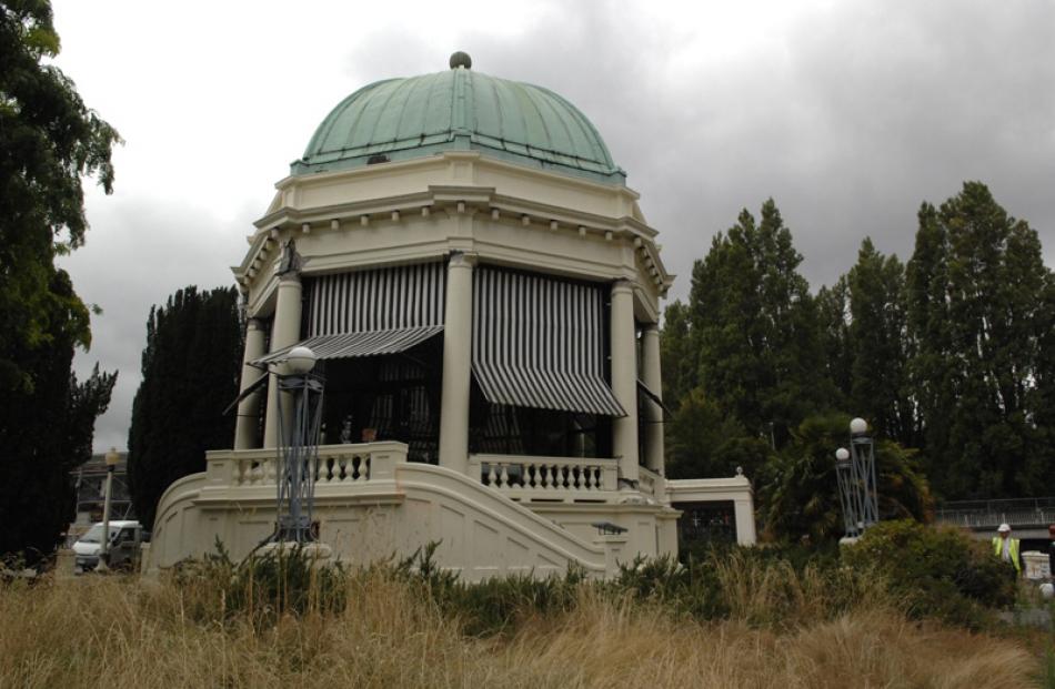 Gardens go wild around the battered Retour Restaurant in an old Cambridge Tce rotunda.