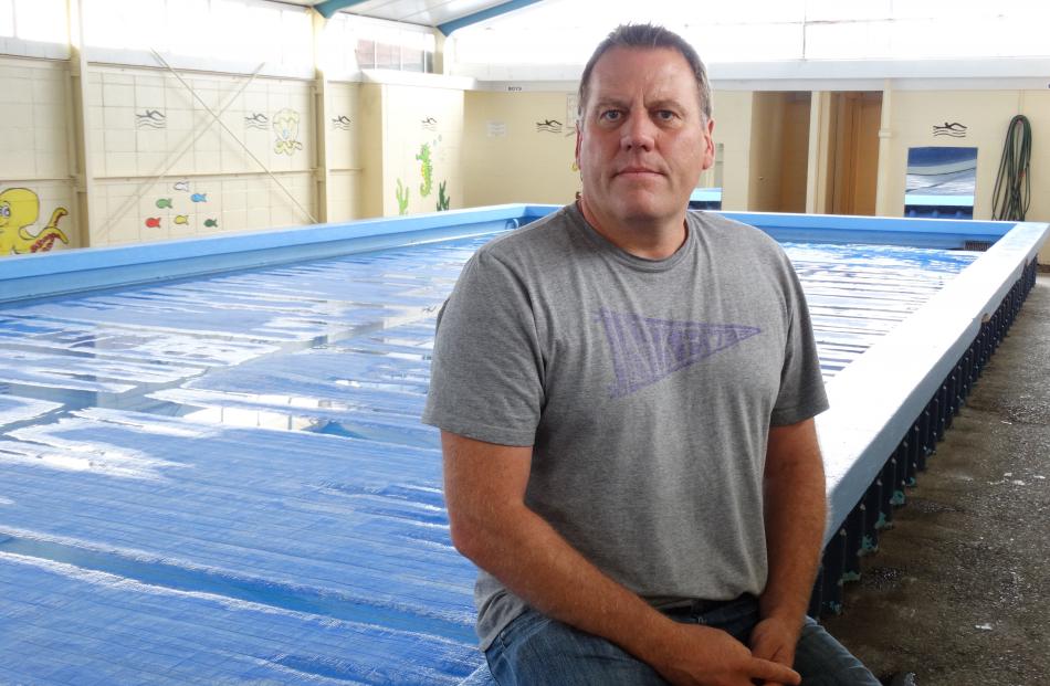 Carisbrook School principal Ben Sincock is considering keeping the school pool open for one term...