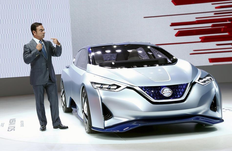 Carlos Ghosn, CEO of the Renault-Nissan Alliance, presents the Nissan IDS concept car at the 44th...