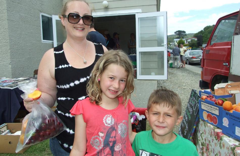 Carolyn, Emily (8), and Sean Reeves (6), all of Christchurch.