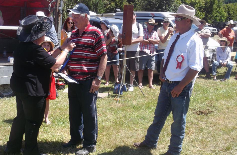 Duvauchelle A&P Show president Andrew Humm (right) watches on as Akaroa-Wairewa Community Board...