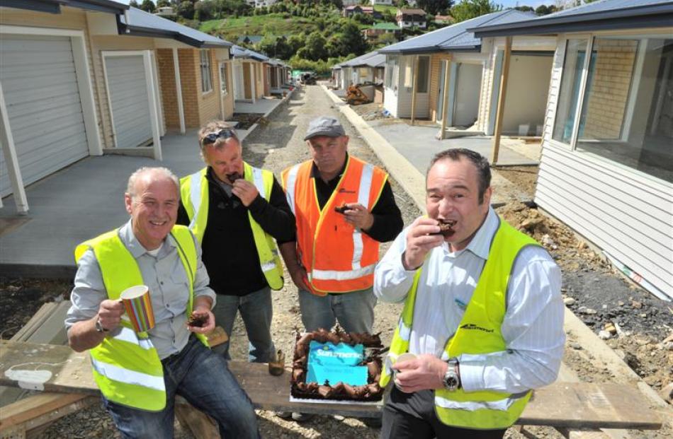 Celebrating an award and the construction of a retirement village in Dunedin being on schedule to...