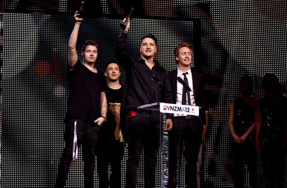 Celebrating their award for best single at the Vodafone New Zealand Music Awards at Vector Arena...