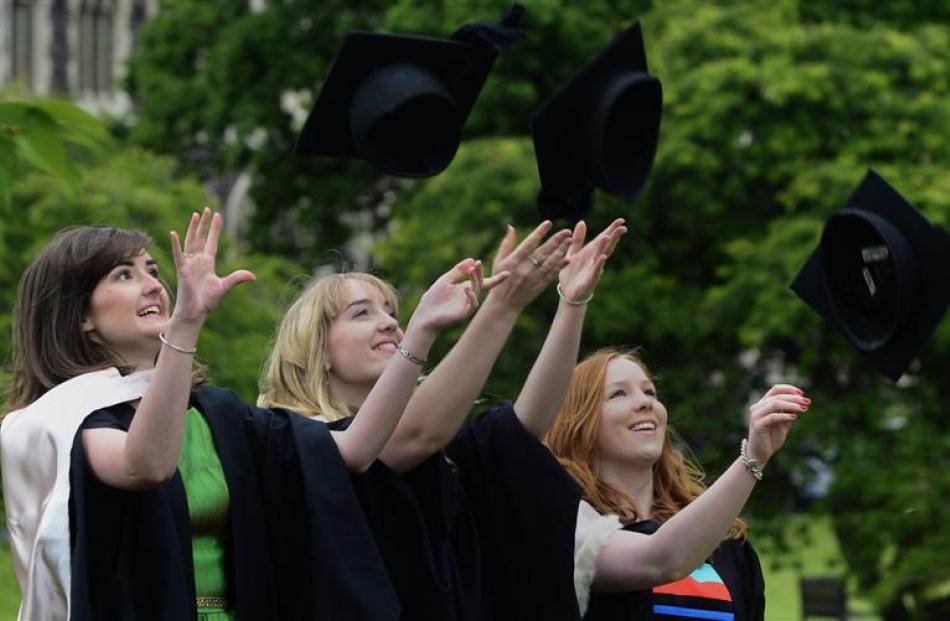 Celebrating their imminent graduation are  (from left) Aimee Burbery (22), Siobhan Kelly (22) and...